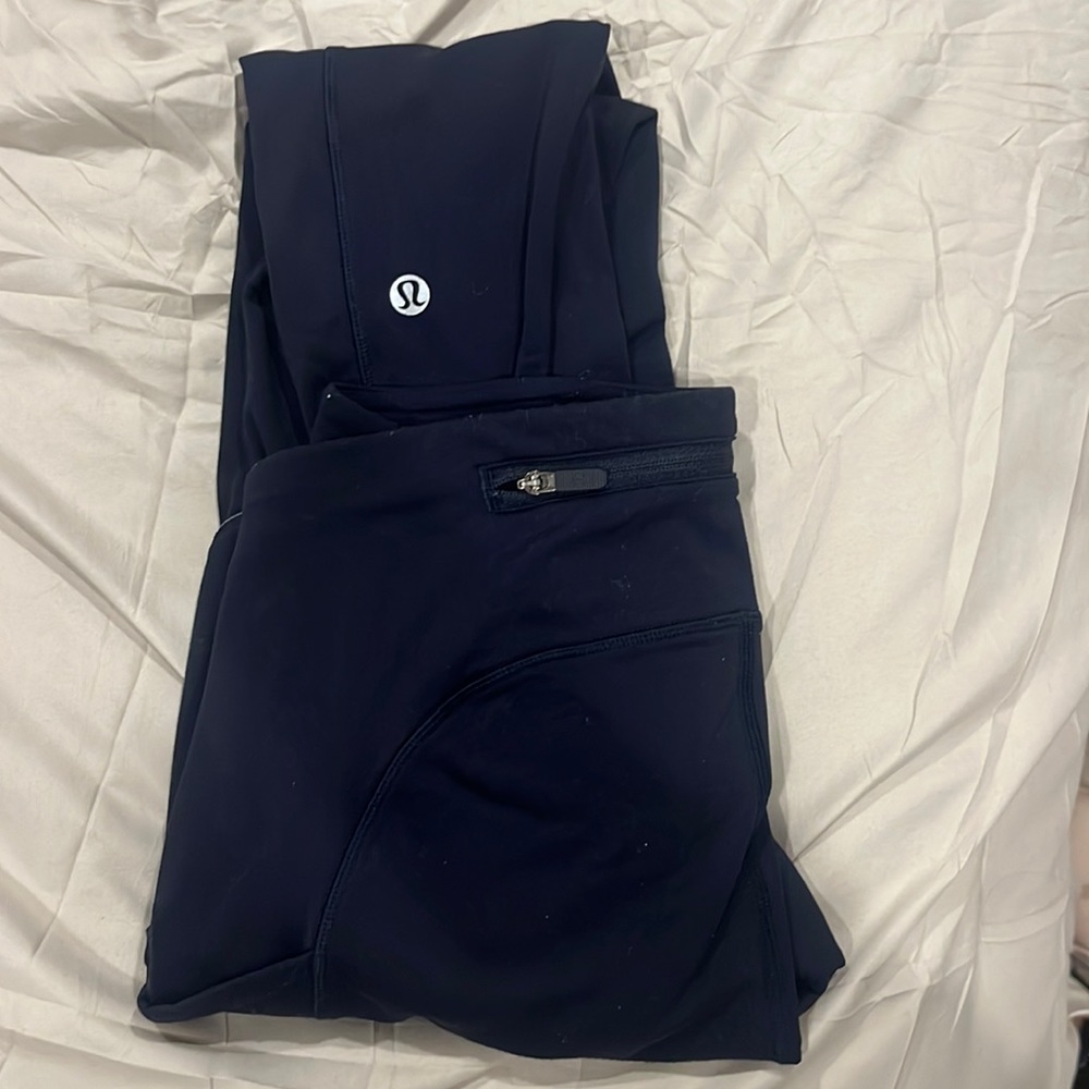 Navy Lululemon leggings with zipper in the back